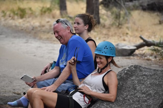 Steve laughing with others outdoors