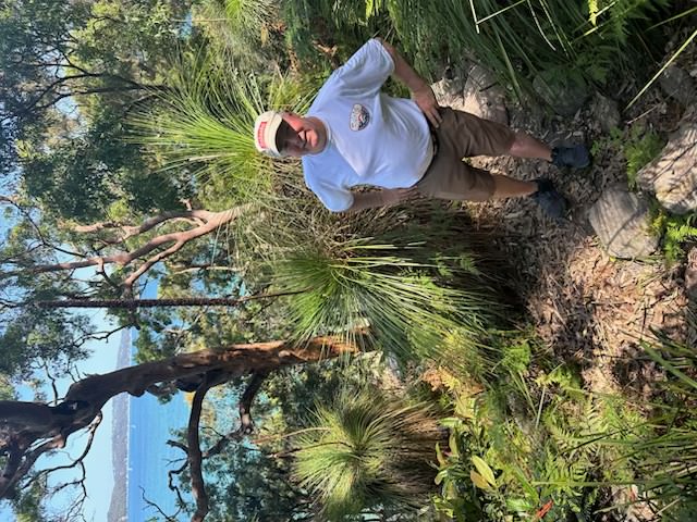 Steve on a hiking trail next to the water